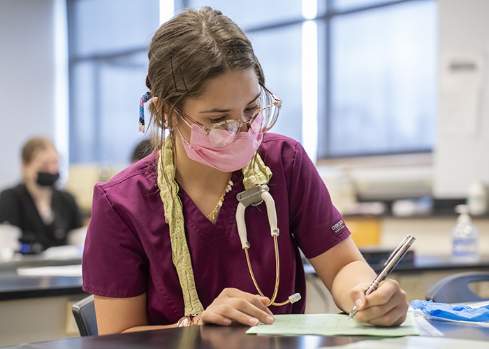 Female medical assisting student